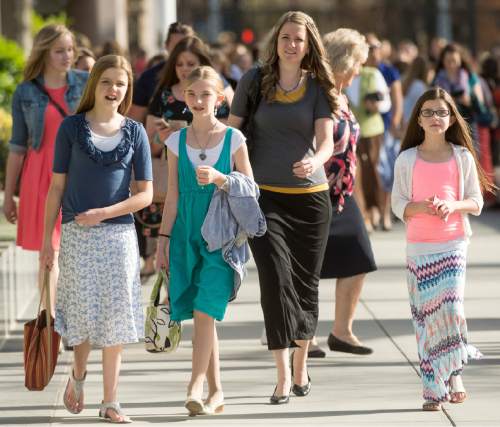 Rick Egan  |  The Salt Lake Tribune

Women walk to the conference center for the first session of the 185th LDS General Conference, designated as the General Women's Meeting, attended by all LDS females 8-years-old and older, Saturday, March 28, 2015.