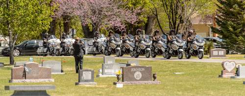 Trent Nelson  |  The Salt Lake Tribune
The motorcade arrives at the funeral of former Utah Governor Norm Bangerter, in South Jordan, Saturday April 18, 2015.