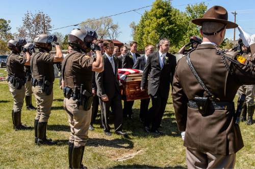 Trent Nelson  |  The Salt Lake Tribune
Pallbearers pass an honor guard at the funeral of former Utah Governor Norm Bangerter, in South Jordan, Saturday April 18, 2015.