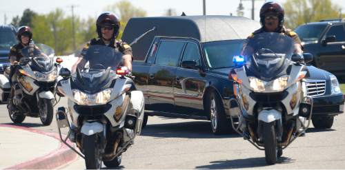 Leah Hogsten  |  The Salt Lake Tribune
Utah Highway Patrol provided motorcycle escort at the funeral for Norm Bangerter at the  LDS Institute of Religion on the campus of Salt Lake Community College in West Jordan, Saturday, April 18, 2015. Norm Bangerter, who served two terms as Utah's 13th governor and guided the state through floods and a sinking economy while buoying up public schools, died Tuesday after suffering a stroke.
