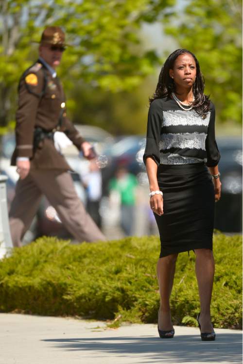 Leah Hogsten  |  The Salt Lake Tribune
Utah Rep. Mia Love arrives at the funeral for Norm Bangerter at the LDS Institute of Religion on the campus of Salt Lake Community College in West Jordan, Saturday, April 18, 2015. Norm Bangerter, who served two terms as Utah's 13th governor and guided the state through floods and a sinking economy while buoying up public schools, died Tuesday after suffering a stroke.
