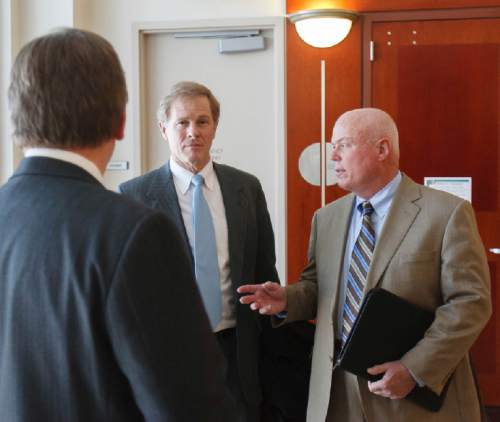 Trent Nelson  |  Tribune file photo
Attorney Jeffrey Shields and Bruce Wisan after at a hearing on the UEP land trust in Salt Lake City in 2013.