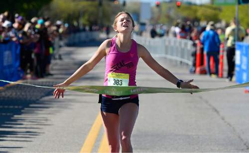 Scott Sommerdorf   |  The Salt Lake Tribune
Nicole Lyons of Provo, was the first woman to cross the finish line at the Salt Lake Marathon, Saturday, April 18, 2015. She is a 4th grade teacher, and this was her first marathon, and she won in a time of 2:58:37.81.