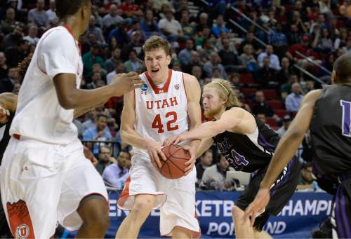 Scott Sommerdorf   |  The Salt Lake Tribune
Utah forward Jakob Poeltl (42) played through some physical defense in the closing minutes as Utah defeated Stephen F. Austin 57-50 at the Moda Center in Portland,, Thursday, March 19, 2015.