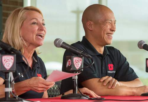 Rick Egan  |  The Salt Lake Tribune

Megan Marsden (left) talks about her new position as a co-gymnastics coach with Tom Farden (right), at a news conference at the Huntsman Center, Tuesday, April 21, 2015.