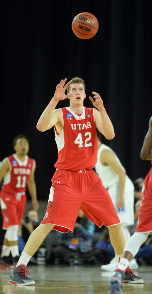 Steve Griffin  |  The Salt Lake Tribune

Utah Utes forward Jakob Poeltl (42) grabs a pass during first half action in the University of Utah versus Duke University Sweet 16 game in the 2015 NCAA MenÌs Basketball Championship Regional Semifinal game at NRG Stadium in Houston, Friday, March 27, 2015.