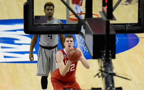Scott Sommerdorf   |  The Salt Lake Tribune
Utah Utes forward Jakob Poeltl (42) at the could line as Georgetown Hoyas guard D'Vauntes Smith-Rivera (4) watches during first half play. Utah defeated Georgetown 75-64 to advance to the "Sweet Sixteen", Saturday, March 21, 2015.