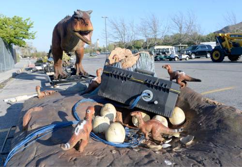 Al Hartmann  |  The Salt Lake Tribune 
Baby dinosaurs just emerged from their eggs in a nest are among the 14 life-size "animatronic" dinosaurs that arrived at Hogle Zoo Monday April 20, 2015. They will be set up throughout the zoo and displayed starting May 1 in the Zoorassic Park 2 exhibit.