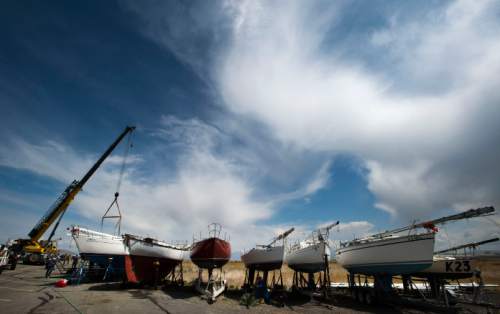 Steve Griffin  |  The Salt Lake Tribune

Sailboats that were removed from the Great Salt Lake State Marina by a crane sit on supports in Salt Lake City, Thursday, April 23, 2015. This time of year sailboats usually are put in, but this time about 80 boats are scheduled to be pulled out in the face of dropping lake levels that threaten to render the marina unusable for sailing.