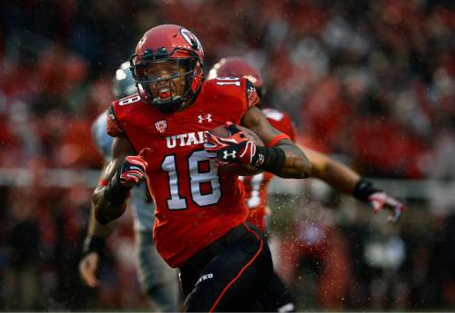 Scott Sommerdorf   |  The Salt Lake Tribune
Utah DB Eric Rowe glides into the end zone with an interception to give Utah a very quick 7-0 lead. Utah took a 21-0 lead over Washington State in the first quarter, Saturday, September 27, 2014.