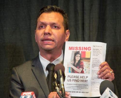 Rick Egan  |  The Salt Lake Tribune

Rosemberg Salgado holds a picture of his niece, as he pleads for help in the search for missing Provo woman, 26-year-old, Elizabeth Elena Laguna-Salgado, who was last seen April 16. Friday, April 24, 2015.