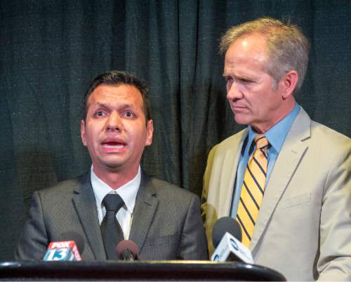 Rick Egan  |  The Salt Lake Tribune

Rosemberg Salgado stands next to Ed Smart at a press conference, as he pleads for help in the search for missing Provo woman, 26-year-old, Elizabeth Elena Laguna-Salgado, who was last seen April 16. Friday, April 24, 2015. Salgado is Elena's uncle.
