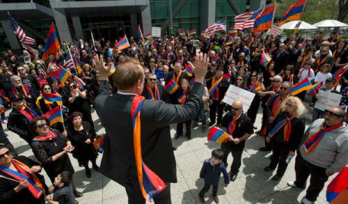 Steve Griffin  |  The Salt Lake Tribune

Sen. Jim Dabakis, D-Salt Lake City, talks to hundreds of Utah Armenians and supporters as they demonstrate in front of Wallace F. Bennett Federal Building in Salt Lake City, Friday, April 24, 2015. The demonstration coincided with the 100th anniversary of the 1915 slaughter of Armenians by the Ottoman Turks at the end of the Ottoman Empire. Historians estimate that up to 1.5 million Armenians were killed. While scholars and several European countries consider the massacres as genocide, the United States government has avoided using the term officially. Dabakis told the group that, "Today we are all Armenians" in support of their efforts.