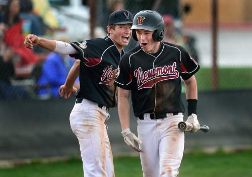 Scott Sommerdorf   |  The Salt Lake Tribune
Viewmont's Zack Larson, right, celebrates with Jacob Bangerter after he scored the Viking's 3rd run in the sixth to make the score 3-1. Viewmont defeated Northridge 3-1, Friday, April 24, 2015.