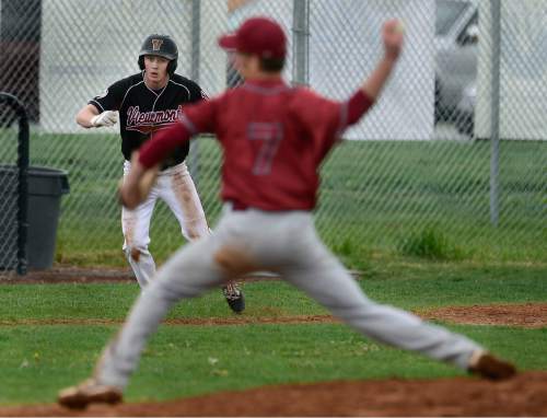 Scott Sommerdorf   |  The Salt Lake Tribune
Viewmont's Zack Larson, keeps an eye on Northrdige pitcher Jodh Brown during sixth inning play. Larson would later score. Viewmont defeated Northridge 3-1, Friday, April 24, 2015.