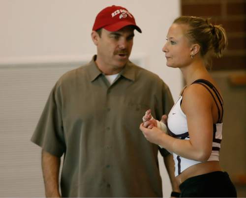 Chris Detrick  |  Tribune file photo
Utah gymnastics coach Greg Marsden talks with Nicolle Ford during a practice in 2006.