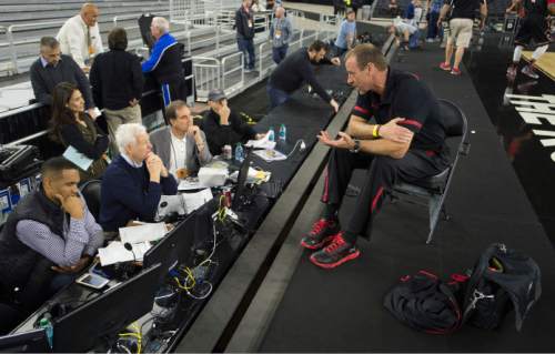 Steve Griffin  |  The Salt Lake Tribune

University of Utah head coach Larry Krystkowiak talks with the national media broadcast anchors as his team practices on the NRG Stadium court prior to their 2015 NCAA Men's Basketball Championship Regional Semifinal game against Duke in Houston, Thursday, March 26, 2015.