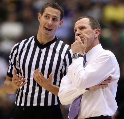 Steve Griffin  |  The Salt Lake Tribune

Weber State head coach, Randy Rahe, listens to the ref explain a call during first half action in the BYU versus Weber State men's basketball game at the Marriott Center in Provo, Utah Wednesday, December 7, 2011.