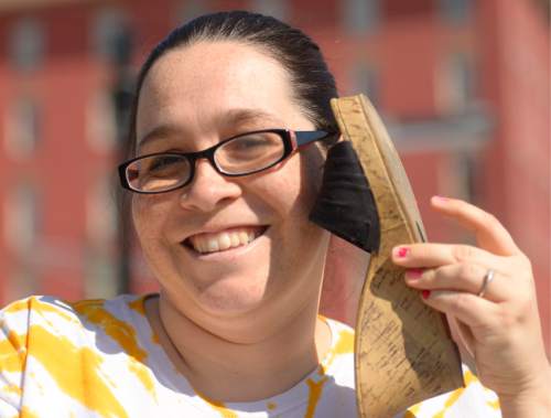 Leah Hogsten  |  The Salt Lake Tribune
"I'm pretty sure I'm going to be sore tomorrow," said Toni Bringhurst who was challenged by her sister Amie Schaeffer who has multiple sclerosis to "walk a mile in her shoes." Bringhurst also wore vaseline on the left lens of her glasses to mimic the poor eyesight her sister has.  MS Walkers enter the Gateway's Olympic Legacy Plaza during the annual walk to  raise money for research on multiple sclerosis and programs and services for people with the disease.