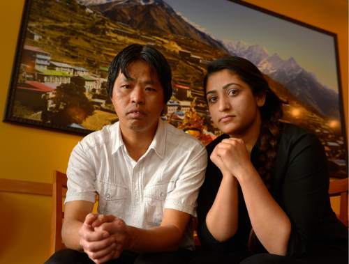 Leah Hogsten  |  The Salt Lake Tribune
l-r Himalayan Kitchen restaurant employees Jit Subba and Samita Bastakoti are thankful to have heard word from their family members in Nepal that they are alive, although their homes were flattened after a powerful earthquake shook Nepal on Saturday, killing more than 1,180 people, collapsing modern houses and centuries-old temples, and triggering a landslide on the slopes of Mount Everest.