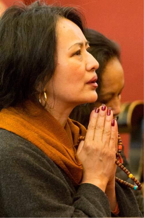 Rick Egan  |  The Salt Lake Tribune

Pema Chagzoetsang prays for the victims of the earthquake in Nepal with the Utah Tibet Society at the Urgyen Samten Ling Gonpa Tibetan Buddhist Temple,Sunday, April 26, 2015.