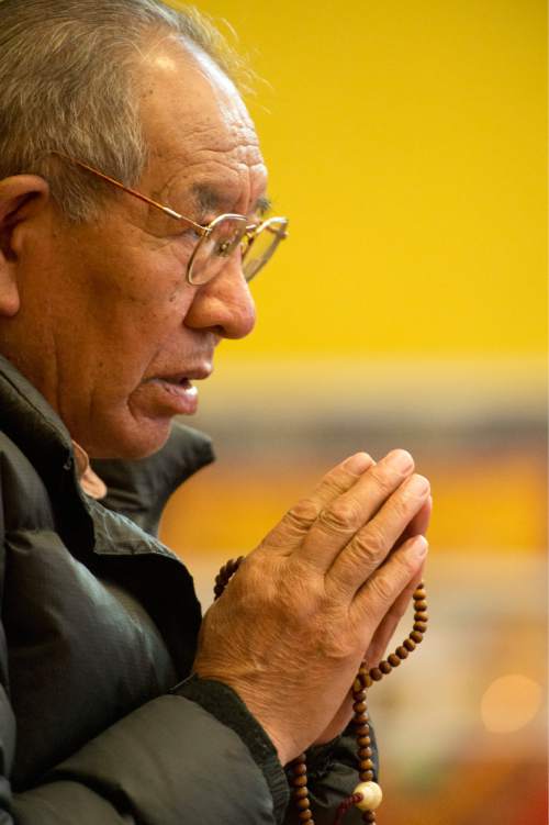 Rick Egan  |  The Salt Lake Tribune

Pema Saga prays for the victims of the earthquake in Nepal with the Utah Tibet Society at the Urgyen Samten Ling Gonpa Tibetan Buddhist Temple,Sunday, April 26, 2015.