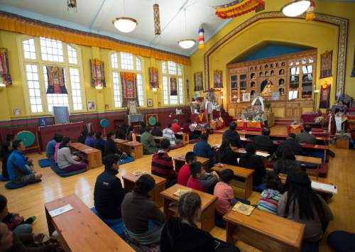 Rick Egan  |  The Salt Lake Tribune

Members of the Utah Tibet Society pray for the victims in the earthquake, at the Urgyen Samten Ling Gonpa Tibetan Buddhist Temple, Sunday, April 26, 2015.