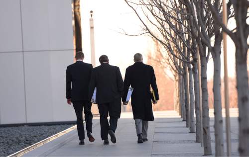 Leah Hogsten  |  The Salt Lake Tribune
l-r Lyle Jeffs, believed to be the FLDS bishop in Hildale, Utah, and Colorado City, Arizona, Nephi Jeffs and FLDS attorney Jim Bradshaw appeared in U. S. District Court in Salt Lake City, Wednesday, January 21, 2015. Both men, who are Warren Jeffs' brothers, have been served subpoenas in a U.S. Department of Labor lawsuit against Paragon Contractors, that provided labor for the Southern Utah Pecan Ranch near Hurricane. Both businesses are owned by members of the FLDS. Labor department investigators, according to court documents, believe that as many as 1,400 school-age children and their parents participated in the harvest.