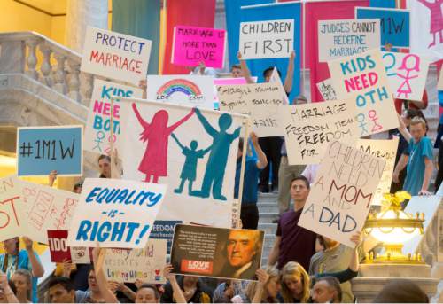 Steve Griffin  |  The Salt Lake Tribune

People hold signs during the Stand for Marriage Rally sponsored by Celebration of Marriage, Standard of Liberty, Utah Eagle Forum, United Women's Forum and Family Watch International at the Capitol in Salt Lake City, Tuesday, April 28, 2015.