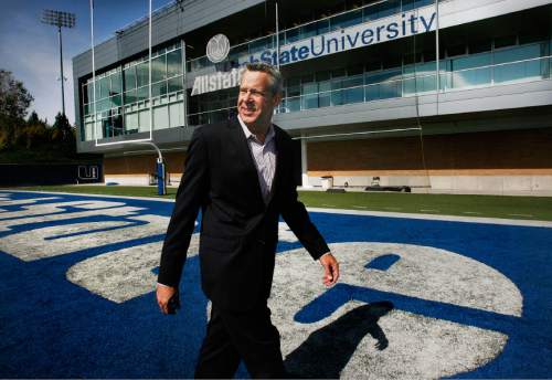 Scott Sommerdorf  |  The Salt Lake Tribune             
Utah State athletics director Scott Barnes in the north end zone with the Laub Center in the background at Romney Stadium, Monday, October 10, 2011.