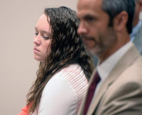 Al Hartmann  |  The Salt Lake Tribune

Meagan Grunwald who is charged as an accomplice in a shooting spree that killed one police officer and wounded another on January 30, 2014 listens to testimony during her trial in Provo, Utah, on Thursday, April 30, 2015.