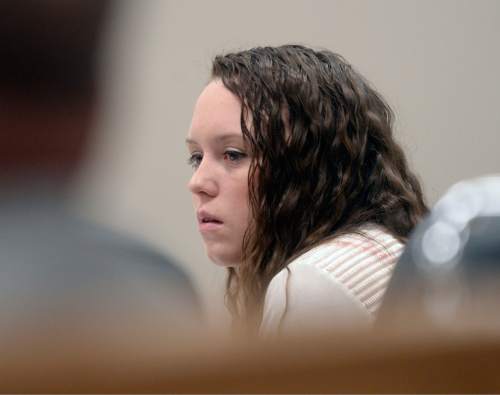 Al Hartmann  |  The Salt Lake Tribune

Meagan Grunwald who is charged as an accomplice in a shooting spree that killed one police officer and wounded another on January 30, 2014 listens to testimony during her trial in Provo, Utah, on Thursday, April 30, 2015.