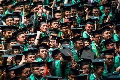 Chris Detrick  |  The Salt Lake Tribune
Students cheer after graduating at Utah Valley University's Commencement Ceremonies at the UCCU Events Center Thursday April 30, 2015.