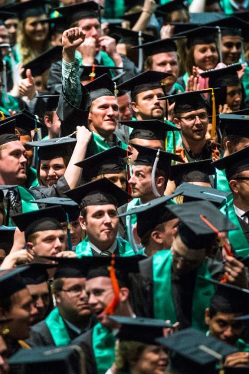 Chris Detrick  |  The Salt Lake Tribune
Students cheer after graduating at Utah Valley University's Commencement Ceremonies at the UCCU Events Center Thursday April 30, 2015.