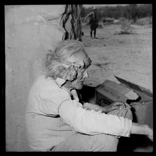 Salt Lake Tribune archive

An elder Navajo women at St. Cristopher's Mission in Bluff, Utah, 1950. St. Christopher's Episcopal Mission was established in 1943 when H. Baxter Liebler, an Episcopal priest from Old Greenwich, Connecticut came to Bluff to establish a mission among the Navajo people. St Christopher's is named after the patron saint of travelers.  When Father Liebler arrived in Bluff, there were no missions, schools, or medical/hospital facilities for the Navajo living in this remote Utah section of the reservation. Before arriving in southeast Utah, Father  Liebler studied the Navajo language to make his message comprehensible to the Dineh and compatible with their understanding of harmony.  He participated in Navajo ceremonies, wore his hair in the traditional Navajo style-long, pulled back and wrapped. A year after the mission was established, a school was started which became the only school for the 1,500 Navajo living in the central part of the Utah strip of the Navajo Reservation. A hospital/ clinic building was completed in 1956.  An estimated 500 babies were born in the clinic during the years it was in operation.