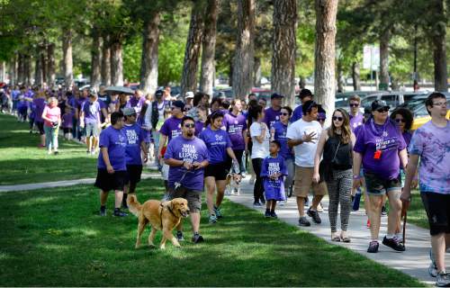 Scott Sommerdorf   |  The Salt Lake Tribune
The Walk to End Lupus Now proceeds along the east edge of Liberty Park in Salt Lake City, Saturday, May 2, 2015.