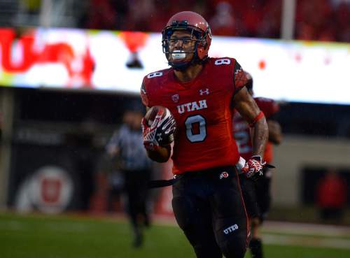 Scott Sommerdorf   |  The Salt Lake Tribune
There is no one around him as Utah kick returner Kaelin Clay returns a punt 58 yards for a TD to give Utah a quick 14-0 lead. Utah took a 21-0 lead over Washington State in the first quarter, Saturday, September 27, 2014.