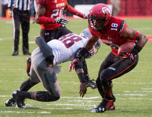 Rick Egan  |  The Salt Lake Tribune

Utah Utes defensive back Eric Rowe (18) picks off a pass intended for Washington State Cougars wide receiver Isiah Myers (88), and runs for a touchdown, in Pac-12 football action, Utah vs. Washington State, at RIce-Eccles Stadium, September 27, 2014