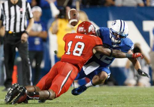 Trent Nelson  |  The Salt Lake Tribune
Utah Utes defensive back Eric Rowe (18) knocks the ball away from Brigham Young Cougars wide receiver JD Falslev (12) in the second quarter as the BYU Cougars host the Utah Utes, college football Saturday, September 21, 2013 at LaVell Edwards Stadium in Provo.