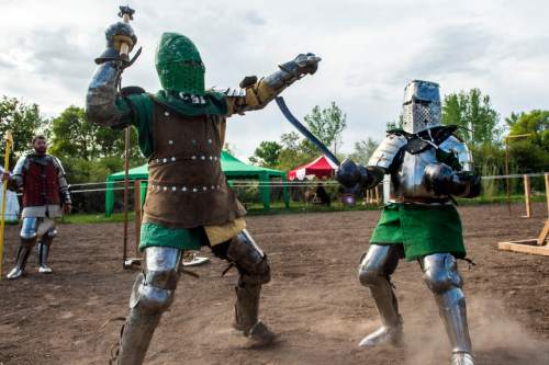 Chris Detrick  |  The Salt Lake Tribune
Armored Combat League member David C. Smith, left, and Ben Warth fight at the The Utah Renaissance Festival & Fantasy Faire in Marriott-Slaterville Saturday May 2, 2015.  It opened Friday and continues 10 a.m.-6 p.m. on Saturday and Sunday. It will be open every Friday, Saturday and Sunday through May 24.