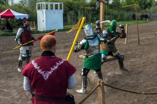 Chris Detrick  |  The Salt Lake Tribune
Armored Combat League member David C. Smith, right, and Ben Warth fight at the The Utah Renaissance Festival & Fantasy Faire in Marriott-Slaterville Saturday May 2, 2015.  It opened Friday and continues 10 a.m.-6 p.m. on Saturday and Sunday. It will be open every Friday, Saturday and Sunday through May 24.