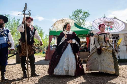 Chris Detrick  |  The Salt Lake Tribune
Queen Mary watches gypsies The Utah Renaissance Festival & Fantasy Faire in Marriott-Slaterville Saturday May 2, 2015.  It opened Friday and continues 10 a.m.-6 p.m. on Saturday and Sunday. It will be open every Friday, Saturday and Sunday through May 24.