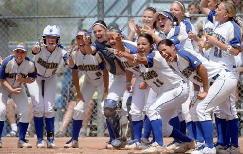 Al Hartmann  |  The Salt Lake Tribune
The number 1 ranked SLCC softball team cheer on their teammate Riana Splinter as she rounds third base after hitting a  home run in the second inning against the Golden Eagles of Southern Idaho Friday May 1.