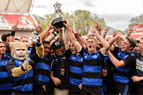 Trent Nelson  |  The Salt Lake Tribune
BYU players celebrate their national championship after defeating Cal in the Penn Mutual Varsity Cup National Rugby Championship at Rio Tinto Stadium in Sandy, Saturday May 2, 2015.