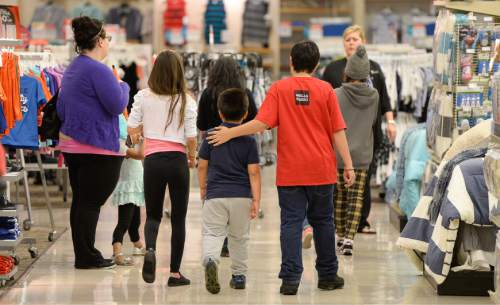 Francisco Kjolseth  |  The Salt Lake Tribune 
In honor of Mother's Day, Smith's invited children from the YWCA to shop for free Mother's Day gifts with the help of a Smith's representative at 455 S. 500 East, in Salt Lake on Monday, May 4, 2015.