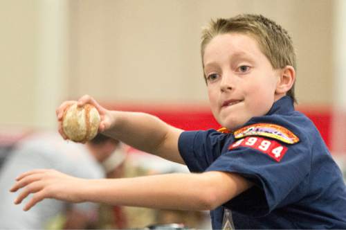 Rick Egan  |  The Salt Lake Tribune

Scott Sorensen,10, throws the baseball for speed, at the Utah Scouting Expo at the South Towne Expo Center, Saturday, May 2, 2015.