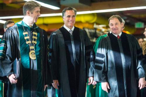 Chris Detrick  |  The Salt Lake Tribune
President Matthew S. Holland, Mitt Romney and Gov. Gary R. Herbert talk before Utah Valley University's Commencement Ceremonies at the UCCU Events Center Thursday April 30, 2015.