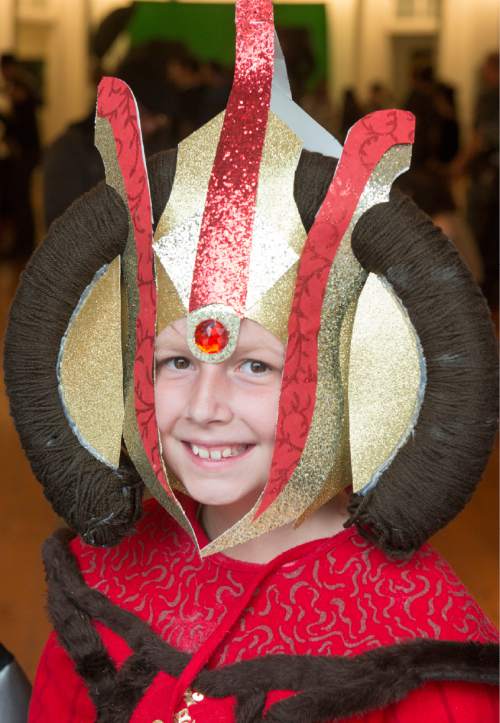 Rick Egan  |  The Salt Lake Tribune

Tabitha Weiland, 11, dresses up to celebrate Star Wars Day at the Urban Arts Gallery at The Gateway, Monday, May 4, 2015.