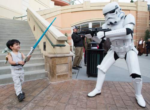 Rick Egan  |  The Salt Lake Tribune

Joah Estrada 4, fights a storm stopper to celebrate Star Wars Day with Salt Lake Comic Con and Urban Arts Gallery at The Gateway, Monday, May 4, 2015.