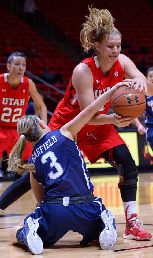 Leah Hogsten  |  The Salt Lake Tribune
Brigham Young Cougars guard Ashley Garfield (3) and Utah Utes forward Taryn Wicijowski (11) fight for the rebound. The University of Utah lost to  Brigham Young University 60-56, Saturday, December 13, 2014 at the Jon M. Huntsman Center.